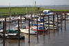 Yachthafen Dangast Schlick Wasserflaute Foto parkende Boote am Siel Nordseekste