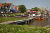 802577_Greetsiel Hafen-Terrassen Bilder, Krabbenfischer Schiffe, Deichwiesen Frhlingsblte gelber Blumen
