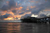 Seebrcke St. Peter-Ording Sonnenuntergang Fotos Wolkenstimmung ber Nordsee Wasser Pfahlbau