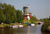 Greetsiel Windmühlen Paar Zwillingsmühlen Foto am Wasser über Kanu- & Bootsverleih für Ausflüge